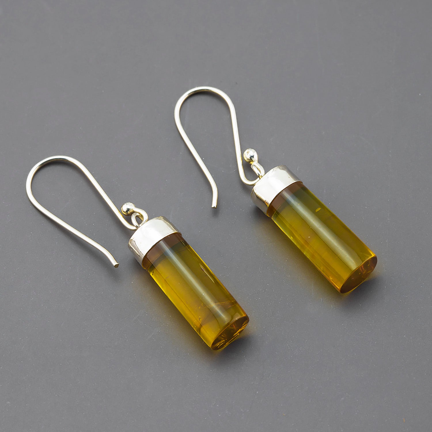 silver and amber cylinder dangle earrings
