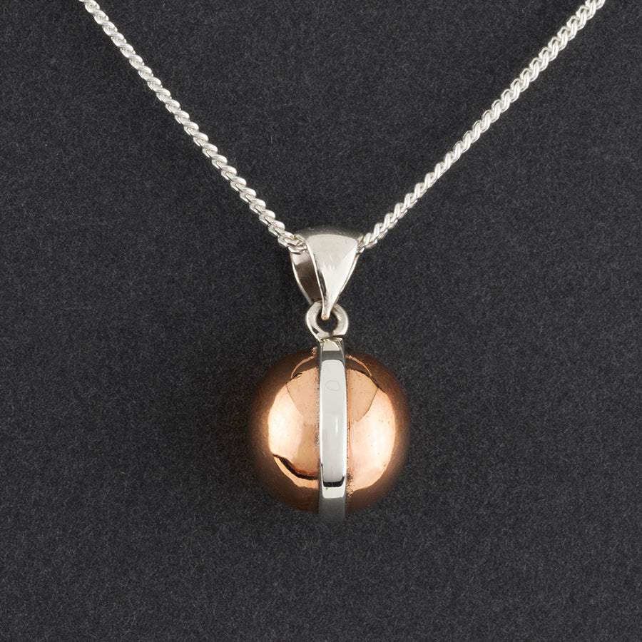 silver and copper ball pendant necklace