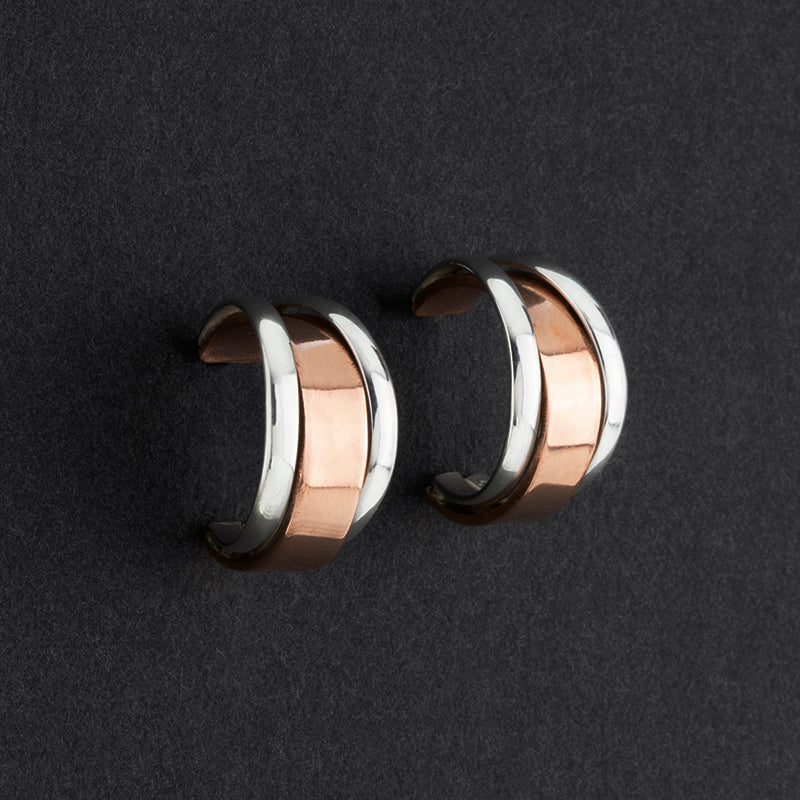 silver and copper rimmed hoop earrings