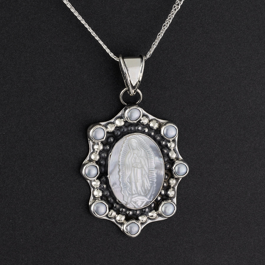 silver and pearl Virgin Mary necklace