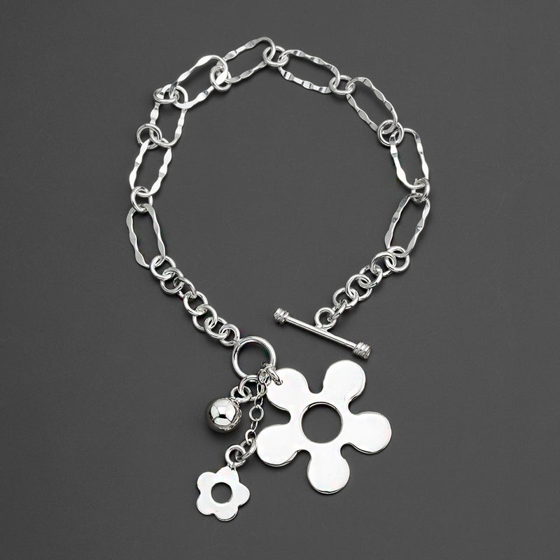 silver daisy jingle charm bracelet