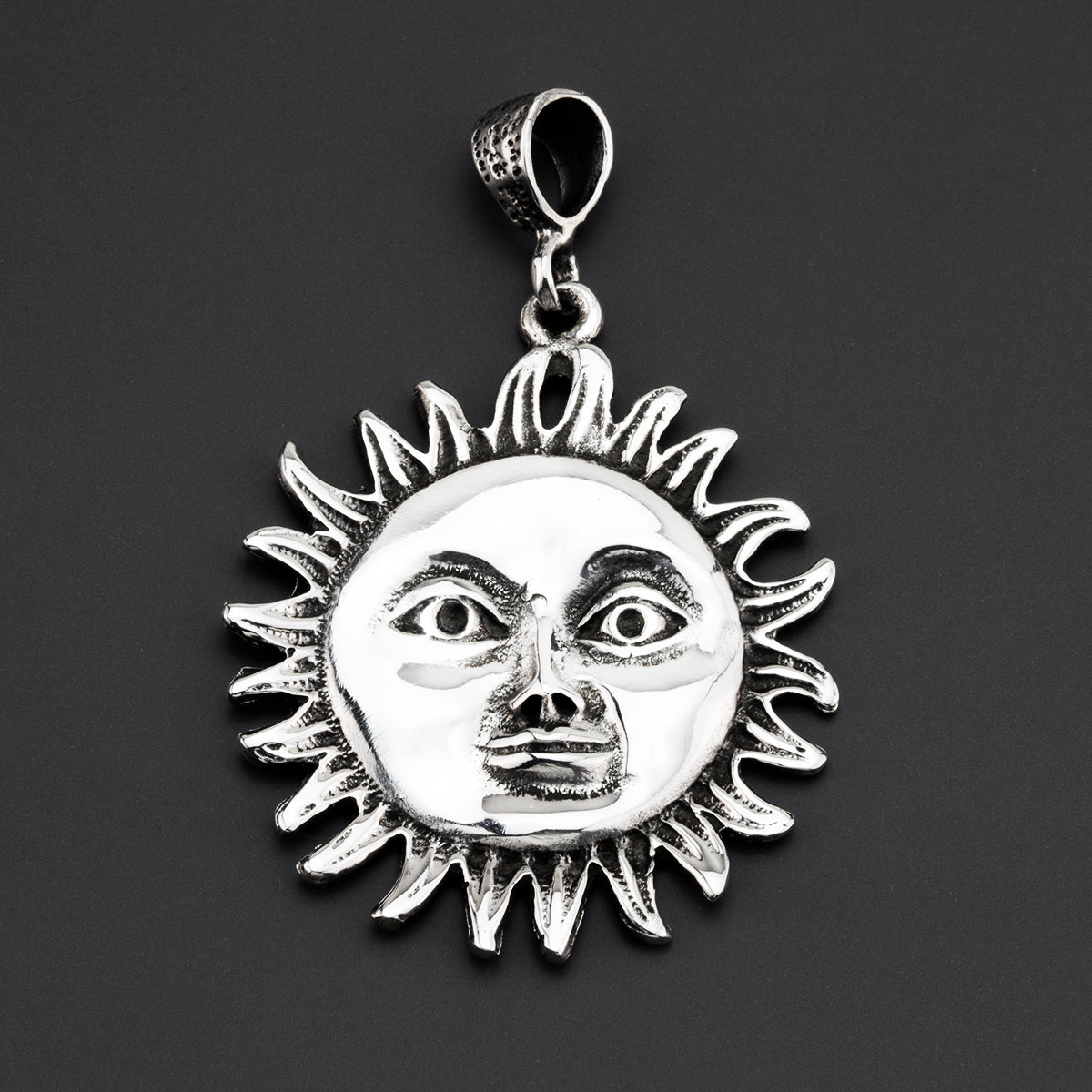 sol eterno Mexican silver pendant