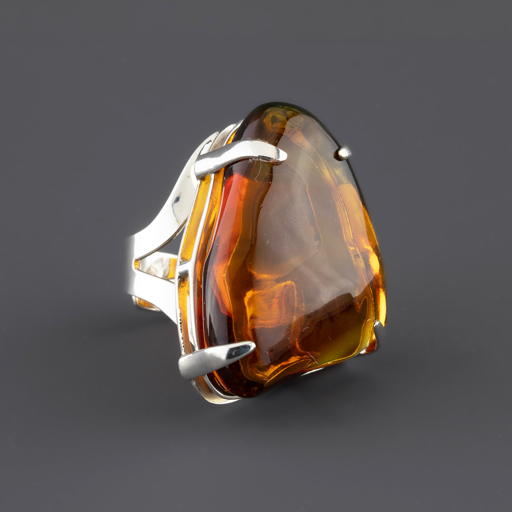 solar claw large Chiapas amber ring