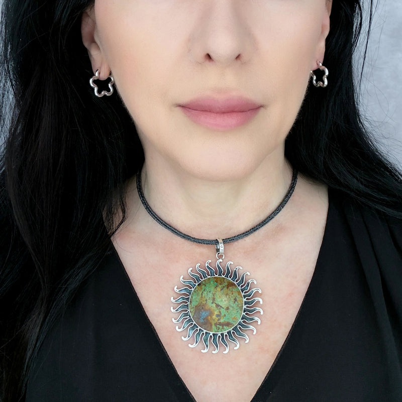 large African turquoise sun pendant