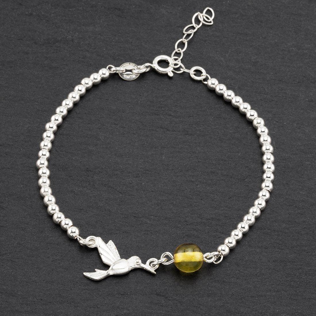 sterling silver and amber hummingbird bracelet