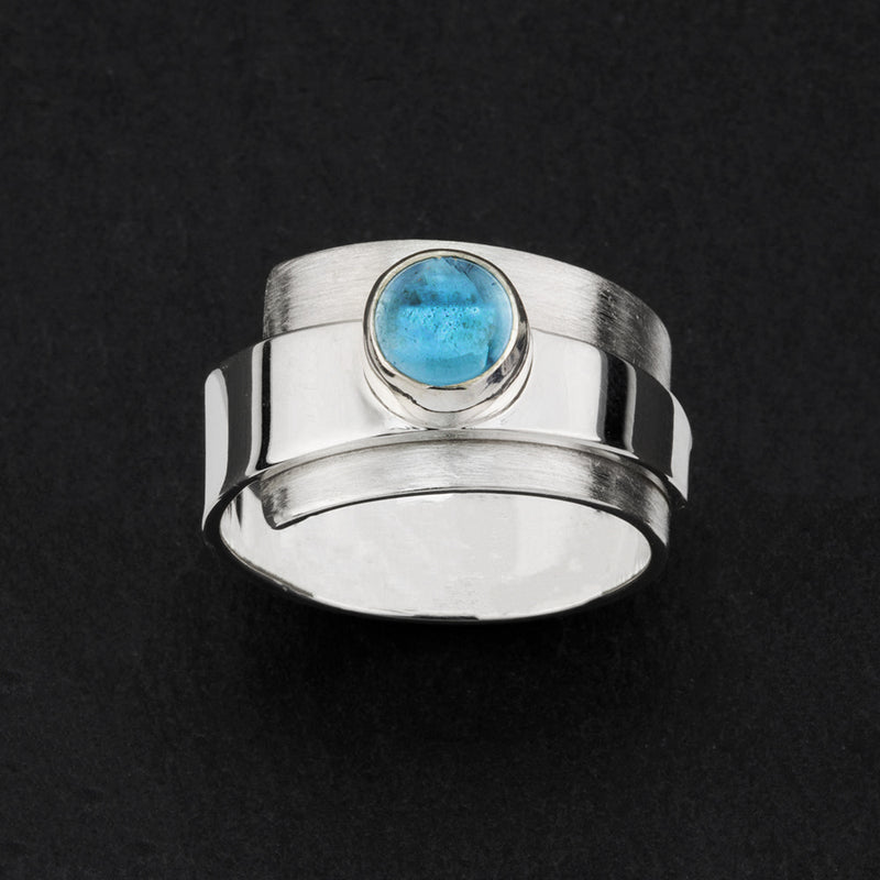 sterling silver and blue topaz wide band ring