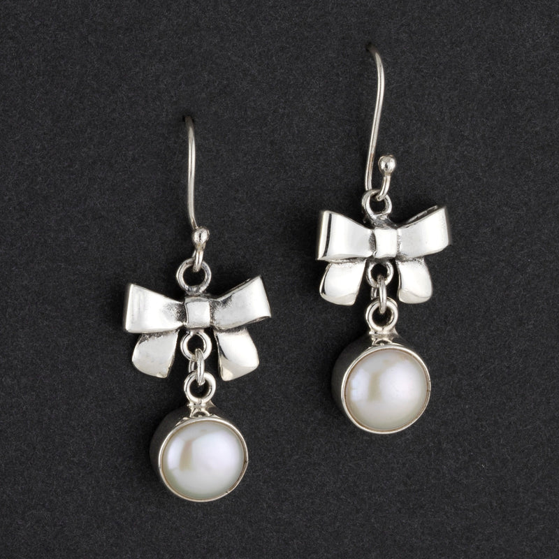 sterling silver and pearl bow dangle earrings