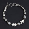 sterling silver and pearl cat bracelet