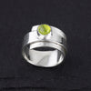 sterling silver and peridot wide band ring
