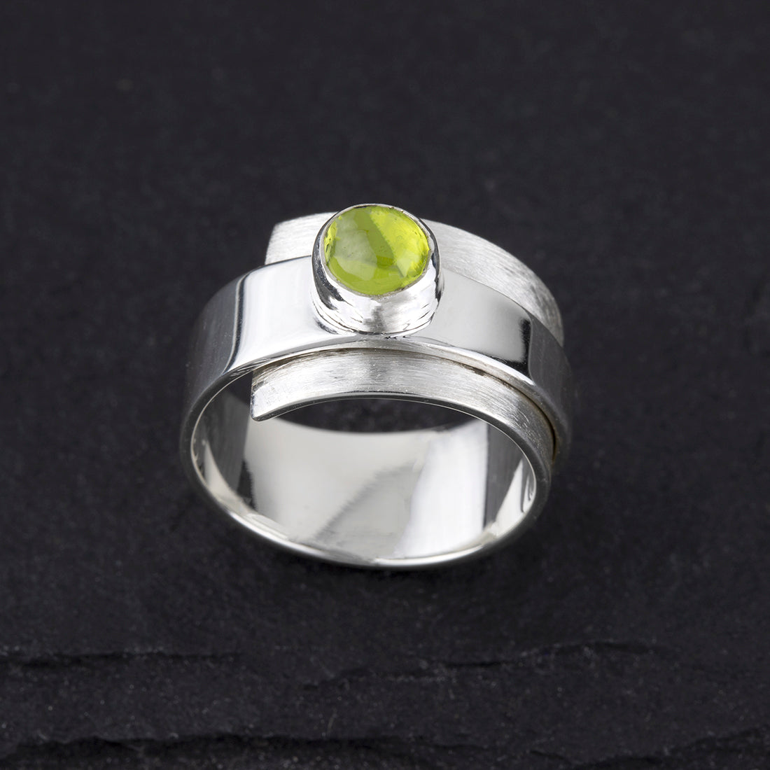 sterling silver and peridot wide band ring