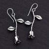 sterling silver carved rose drop earings