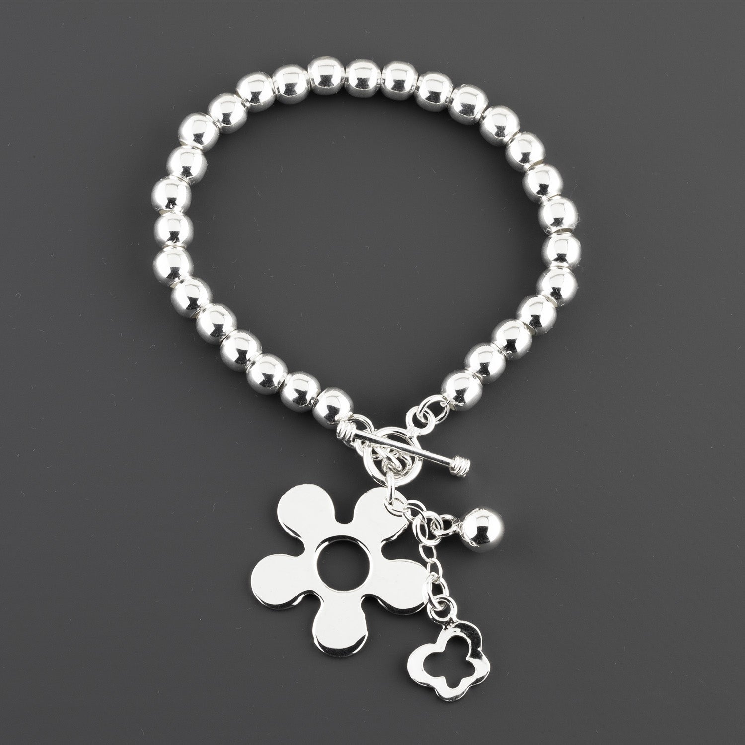 sterling silver daisy charm bracelet
