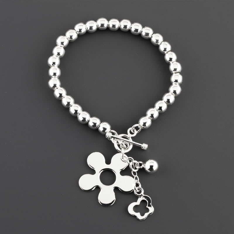 sterling silver daisy charm bracelet