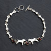 sterling silver and garnet dog lover bracelet