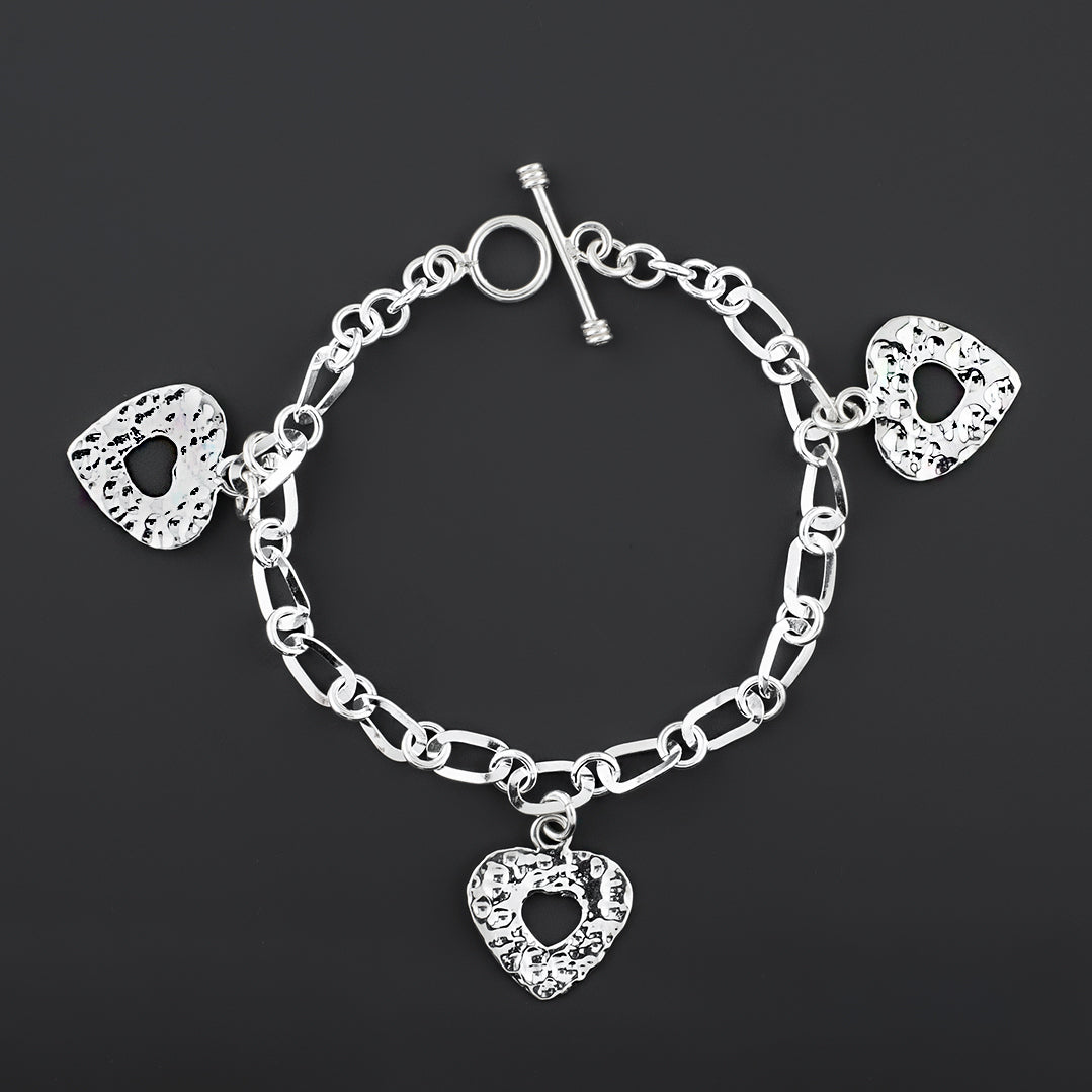 sterling silver triple heart charm bracelet