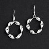 sterling silver twisted ribbon drop earrings