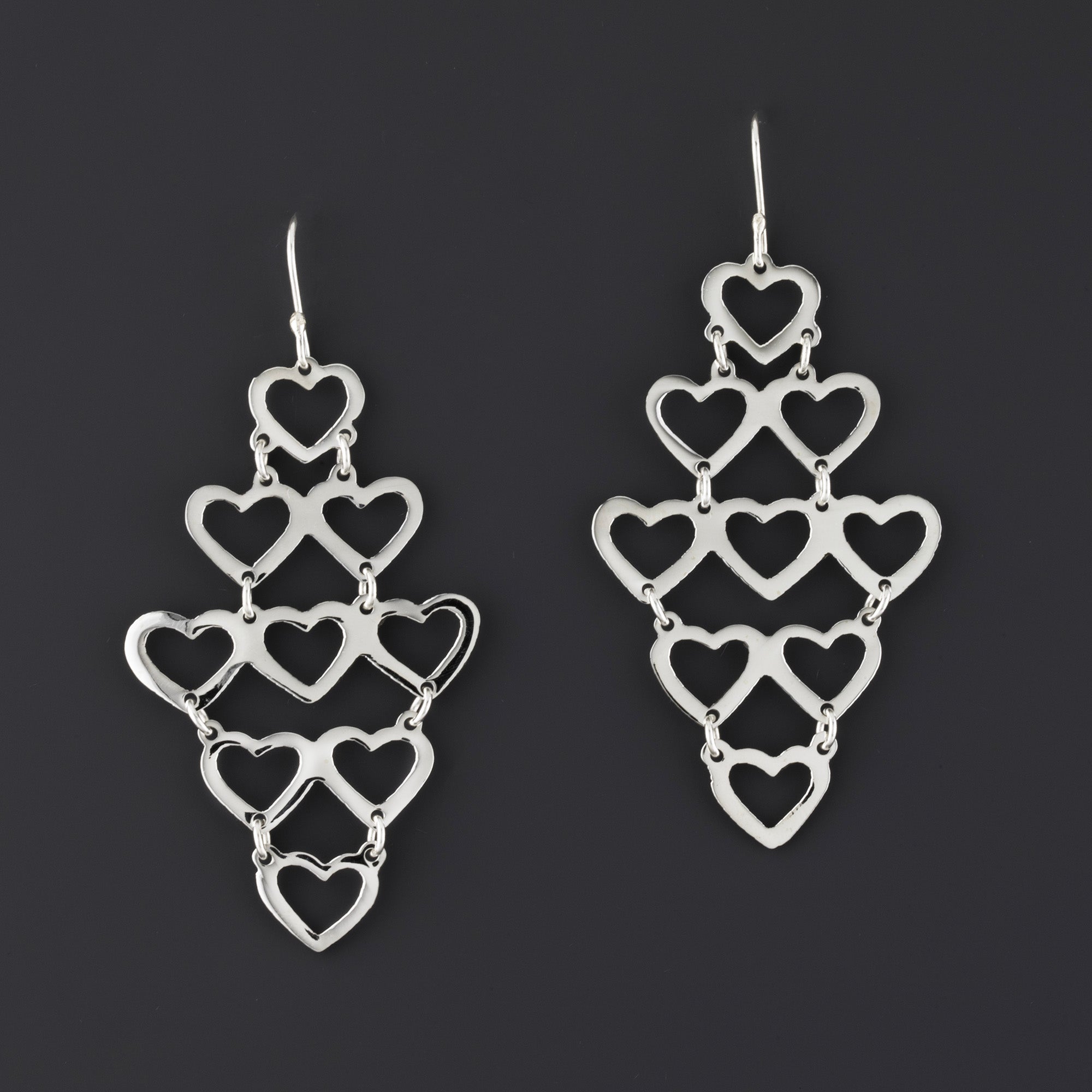 sweet drama sterling silver heart earrings