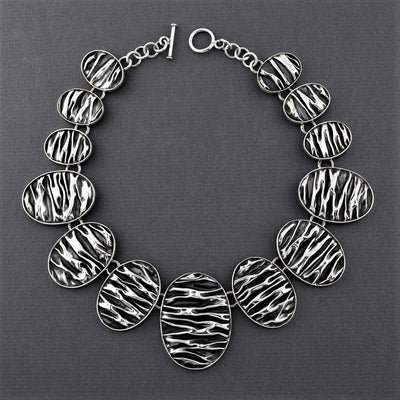 Taxco oxidized silver oval corrugated statement necklace