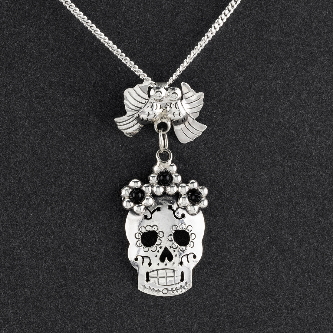 Taxco silver and onyx sugar skull pendant 