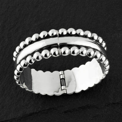 Taxco silver beaded hinged bangle bracelet