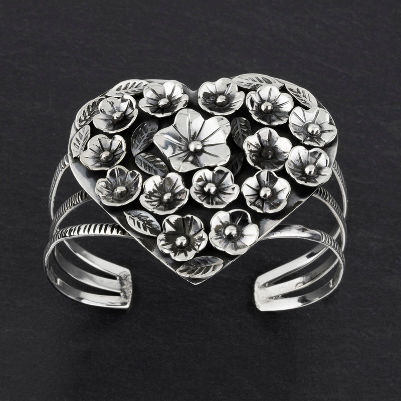 Taxco silver heart shaped floral cuff bracelet