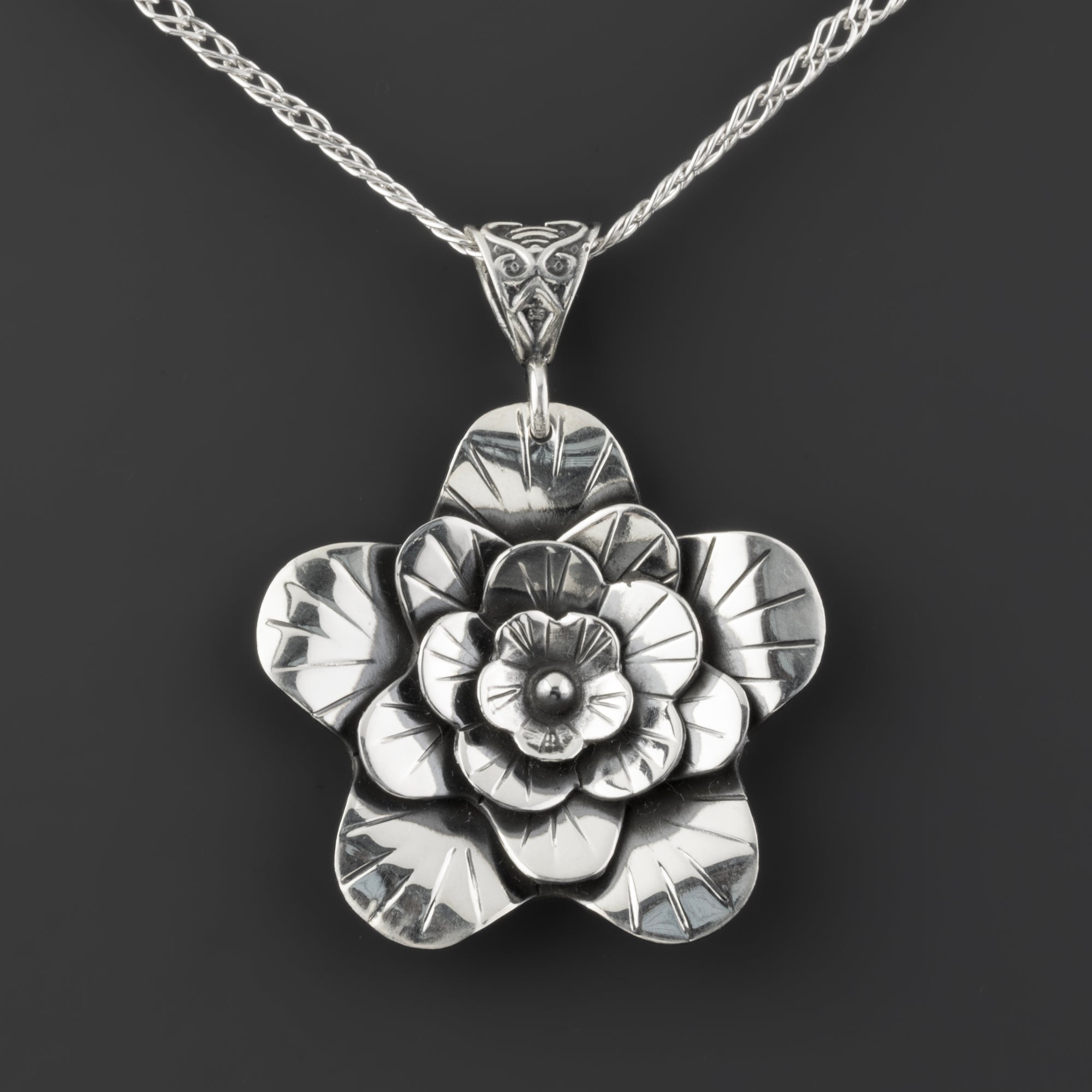 Taxco sterling silver floral pendant