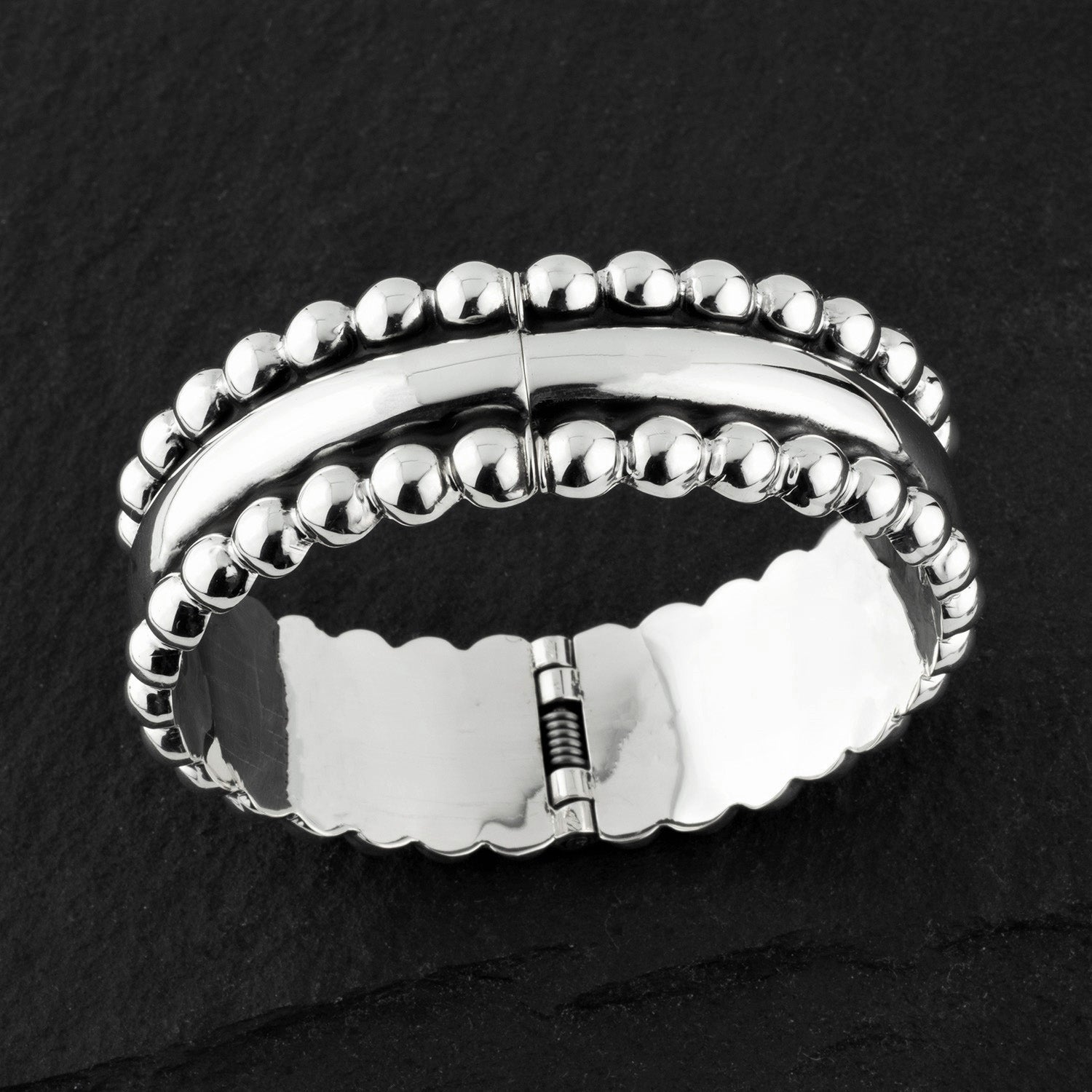Taxco treasure hinged bangle bracelet