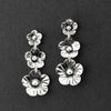triple floral Mexican silver earrings