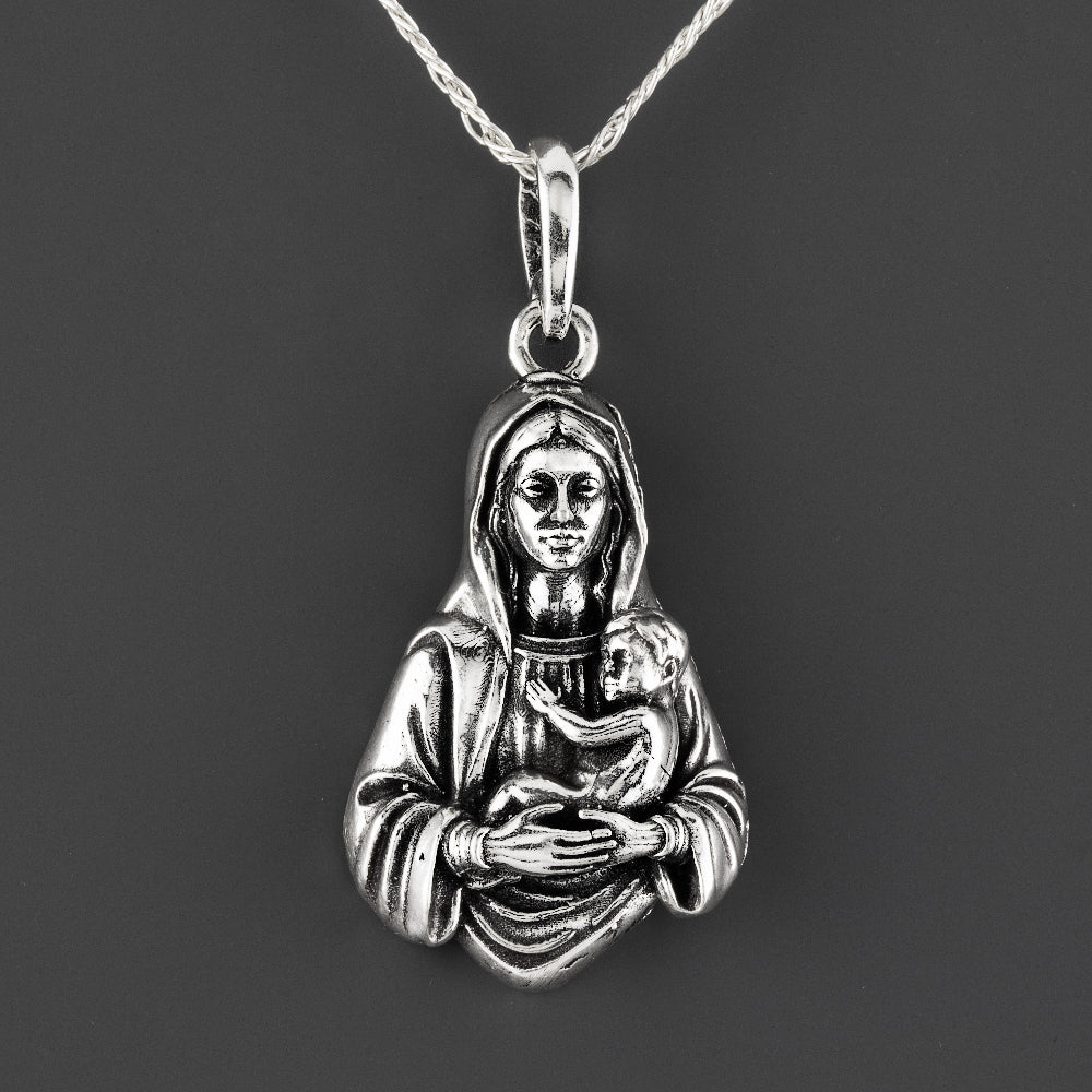 Virgin Mary with a child sterling silver pendant