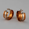 wide silver and copper hoop earrings